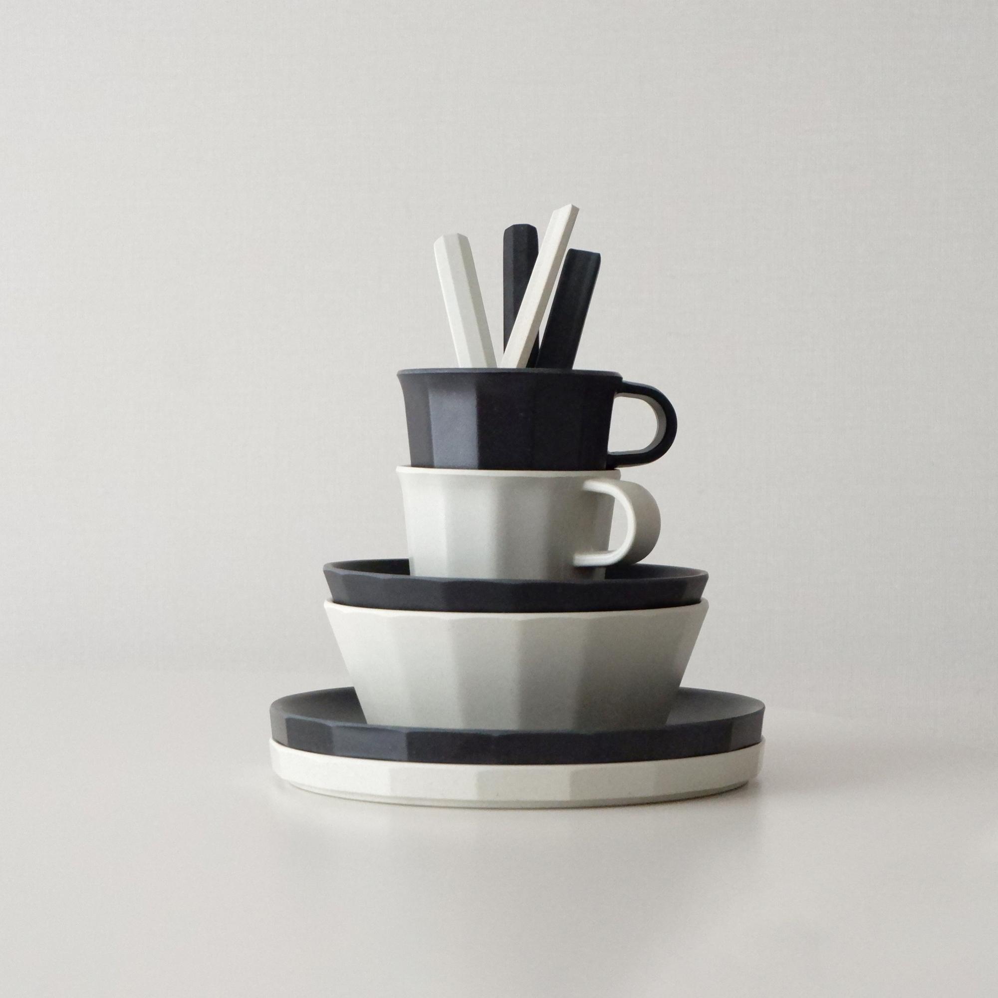 studio workspace with tools and plated dishes
